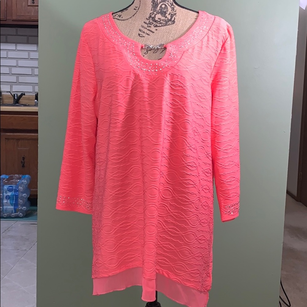 Swirly pattern bring pink shirt